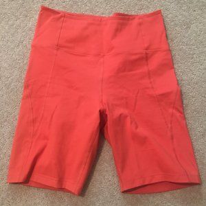 girlfriend collective high-rise bike shorts (coral)